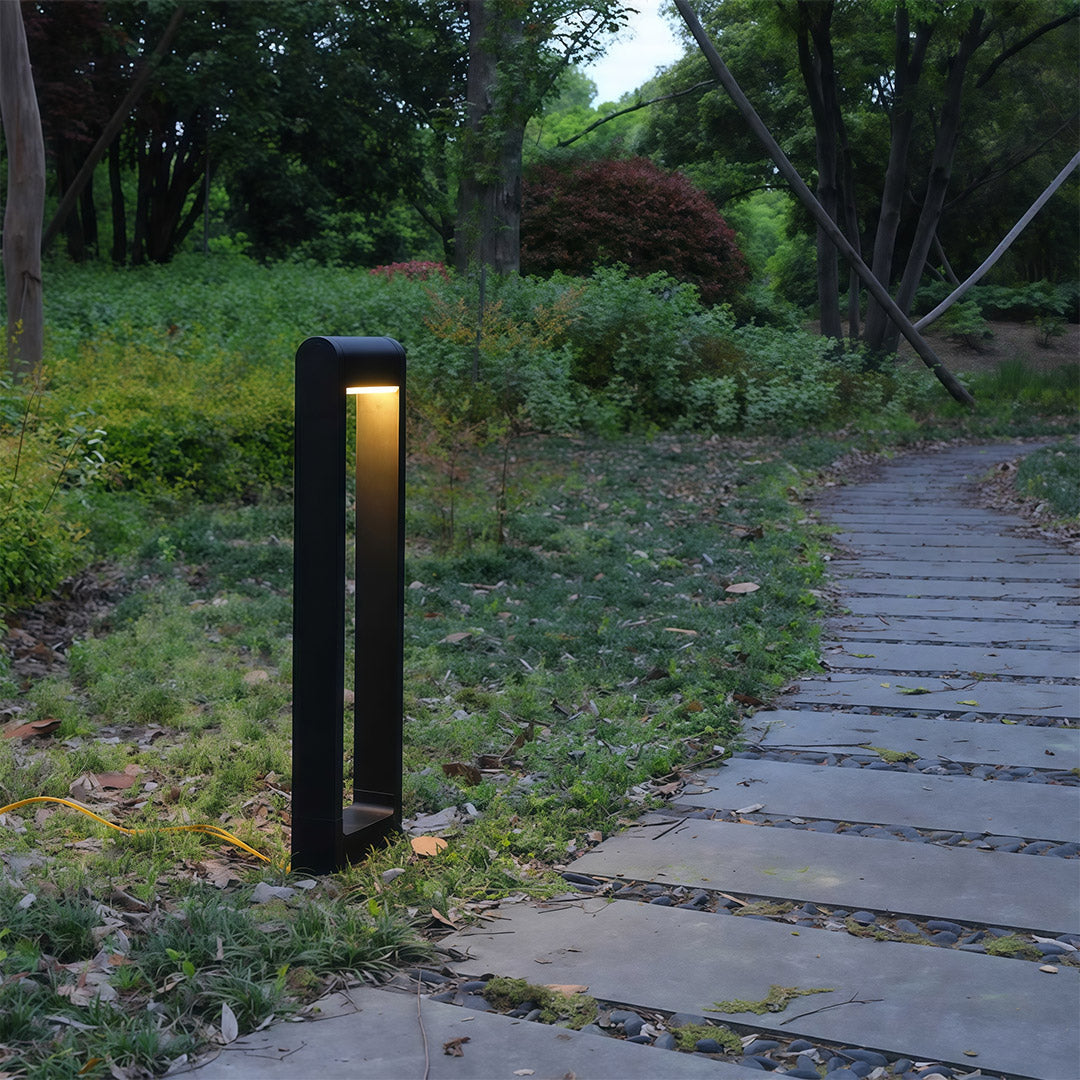Pathway bollard light along a garden pathway, offering stylish and functional lighting.