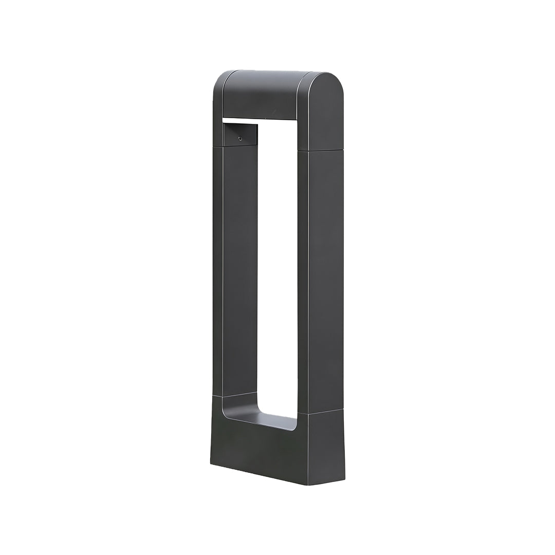 Pathway bollard light featuring a minimalist black rectangular frame and warm light.