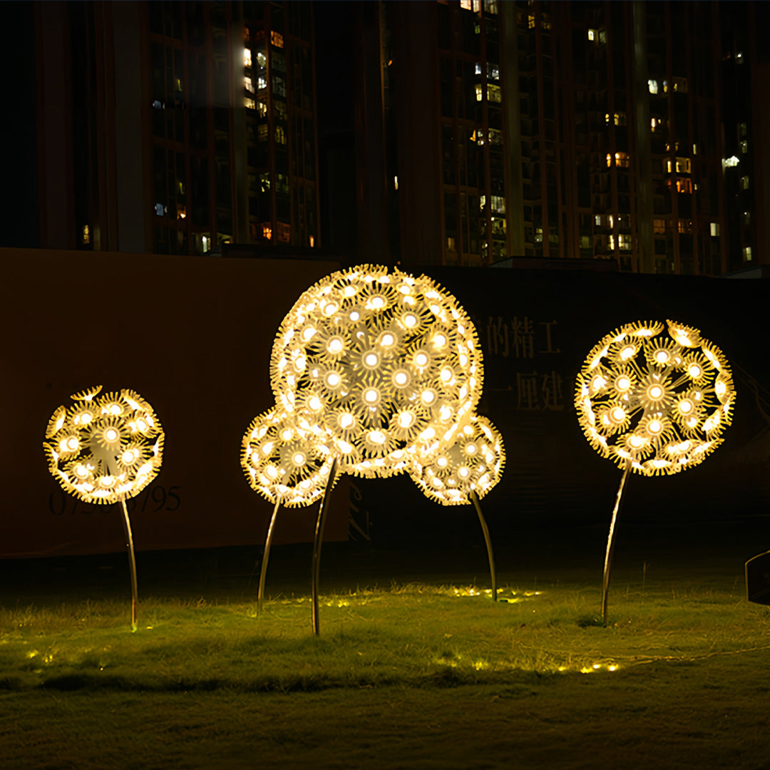 Multiple glowing dandelion garden lights outdoor lining pathway near arch structure.