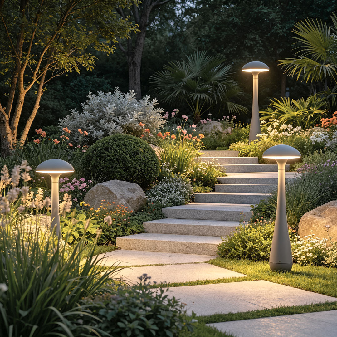 Pathway landscape lights illuminating a modern home garden path with elegant warm LED lighting.