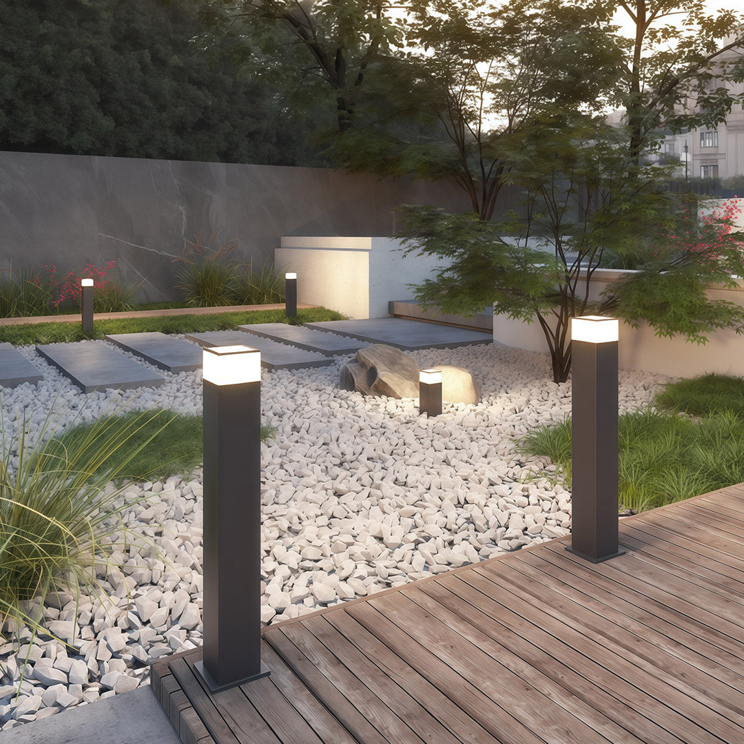 Pathway yard light placed near a deck area, enhancing the outdoor ambiance with subtle lighting.