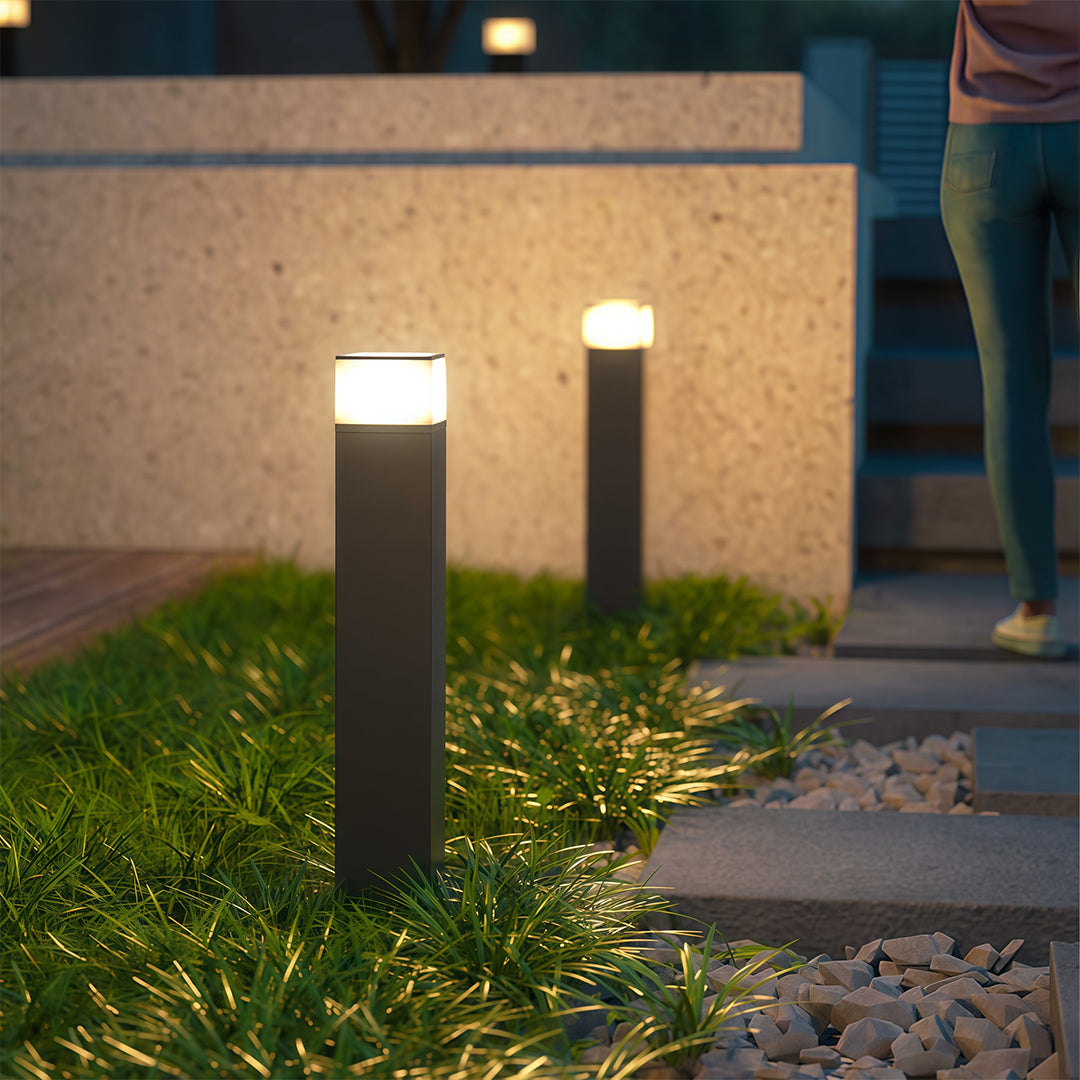 Pathway yard light installed along a garden pathway, providing warm and inviting illumination.