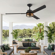 Black ceiling fan with lighting installed above a covered patio with modern outdoor seating.