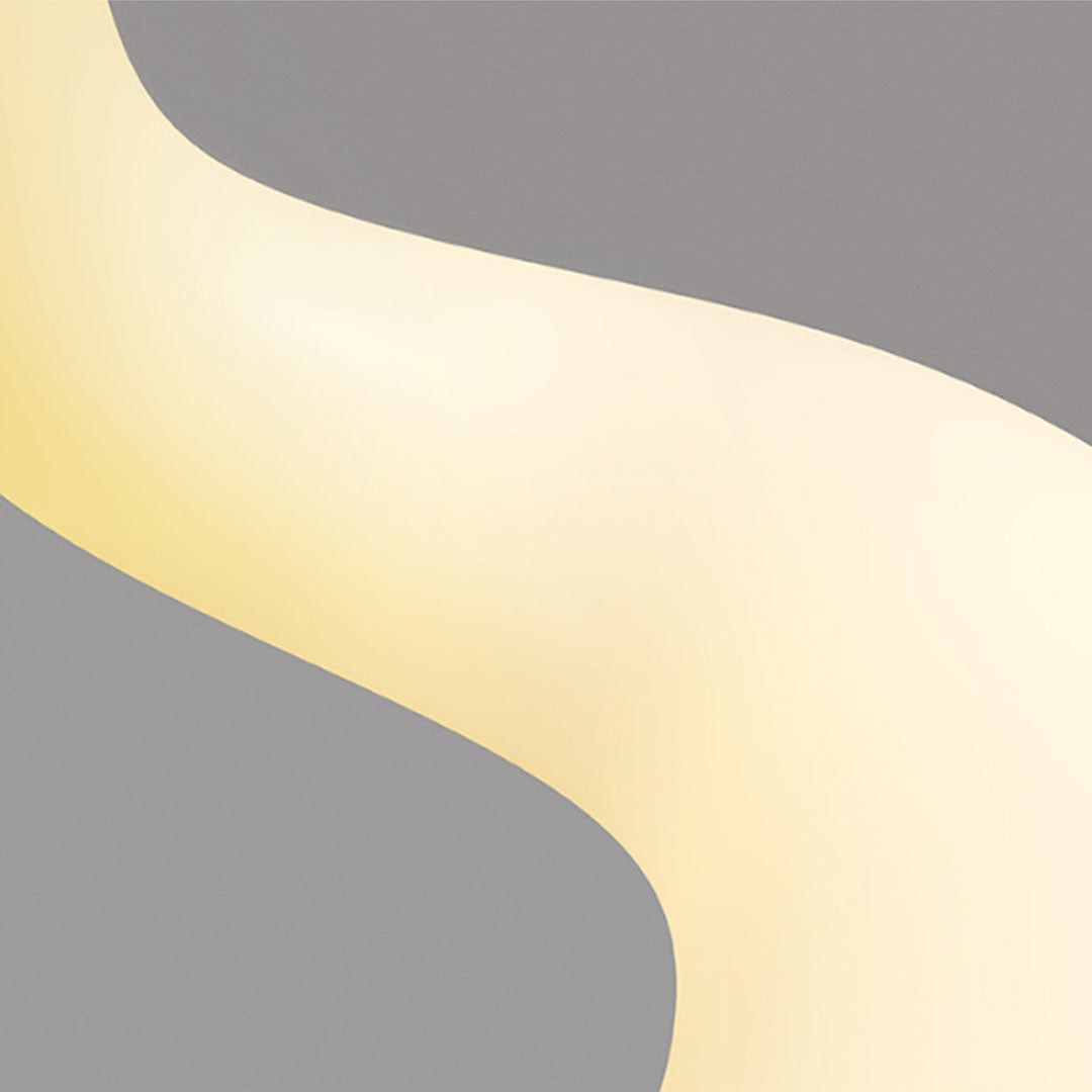 Close-up detail of patio outdoor floor lamps showing smooth curved glowing diffuser surface.