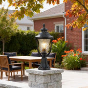 Modern pillar light in a patio setting, warm and stylish outdoor lighting solution