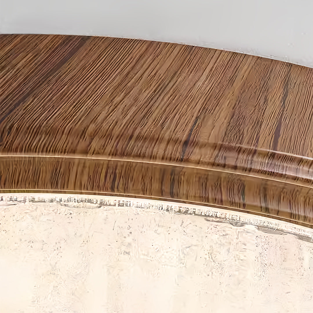 Wood flush mount ceiling light with detailed edge pattern creating sophisticated ambient lighting
