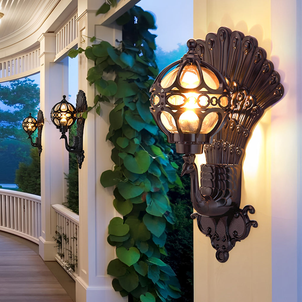 Peacock wall light installed on porch column with classic lantern design.