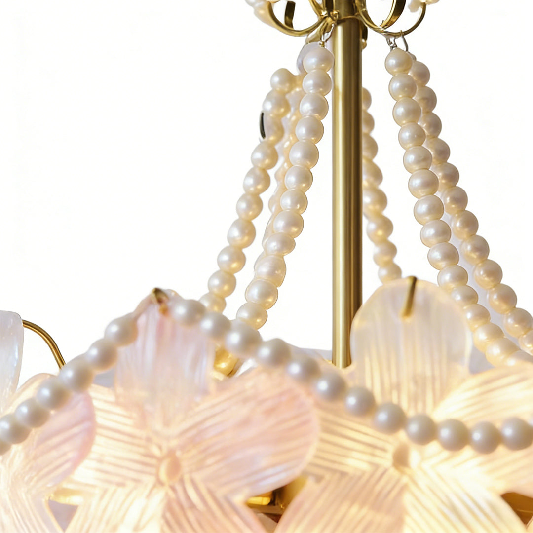 Pearl flower chandelier with a close-up of its pearl strands and floral lights.