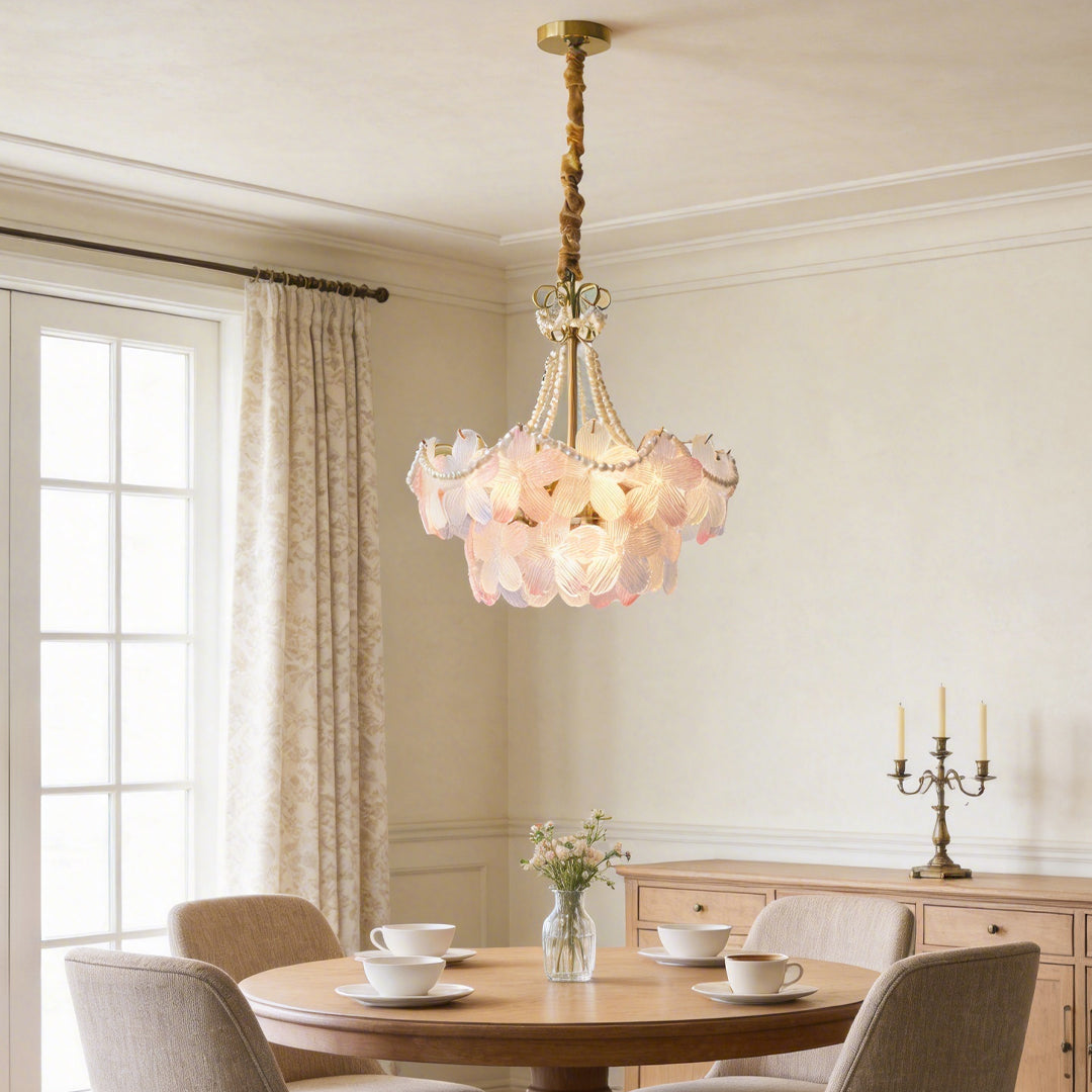 Pearl flower chandelier with elegant floral design, illuminating a classic dining room.