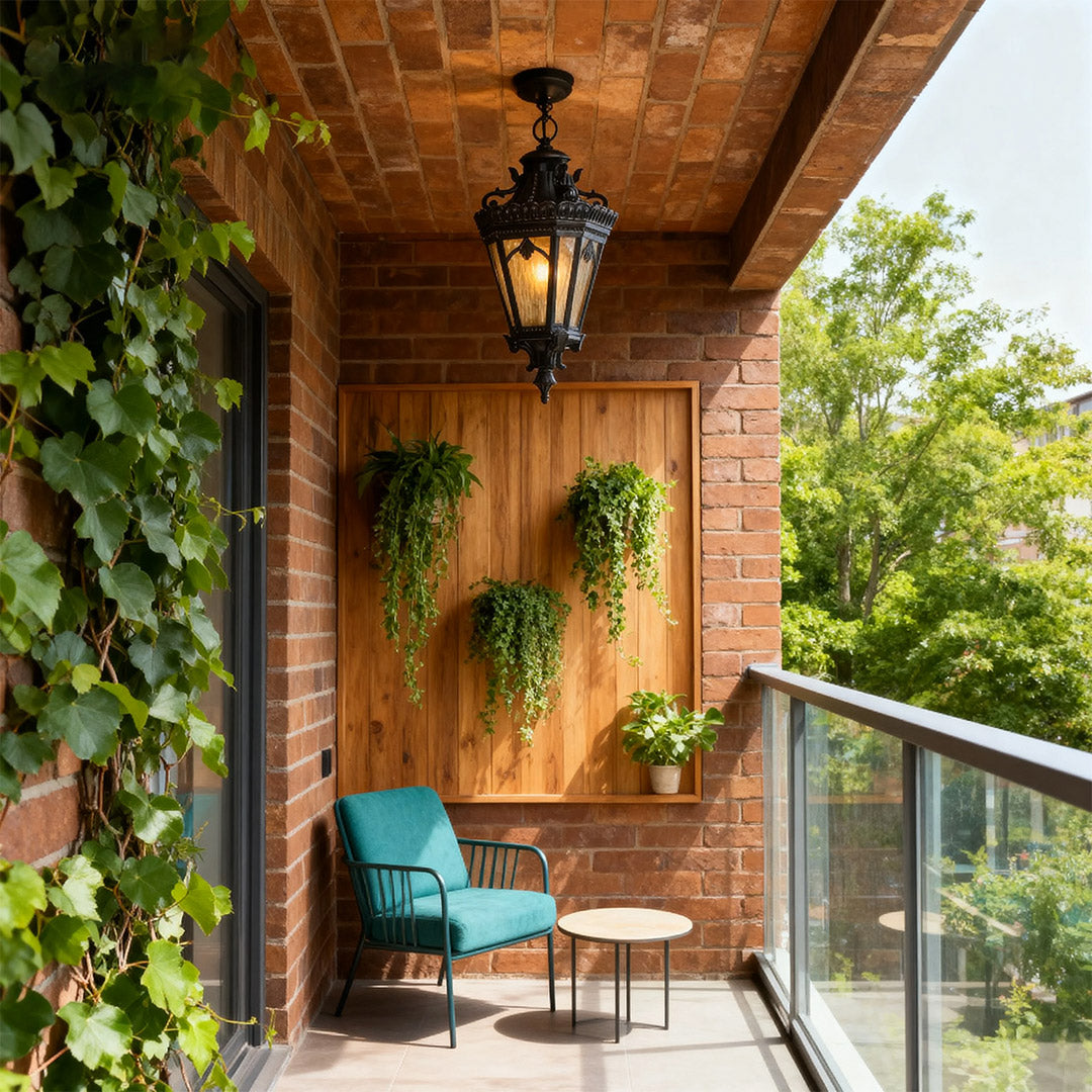 Pendant light outdoor illuminating wood-paneled porch ceiling with turquoise chair and outdoor seating