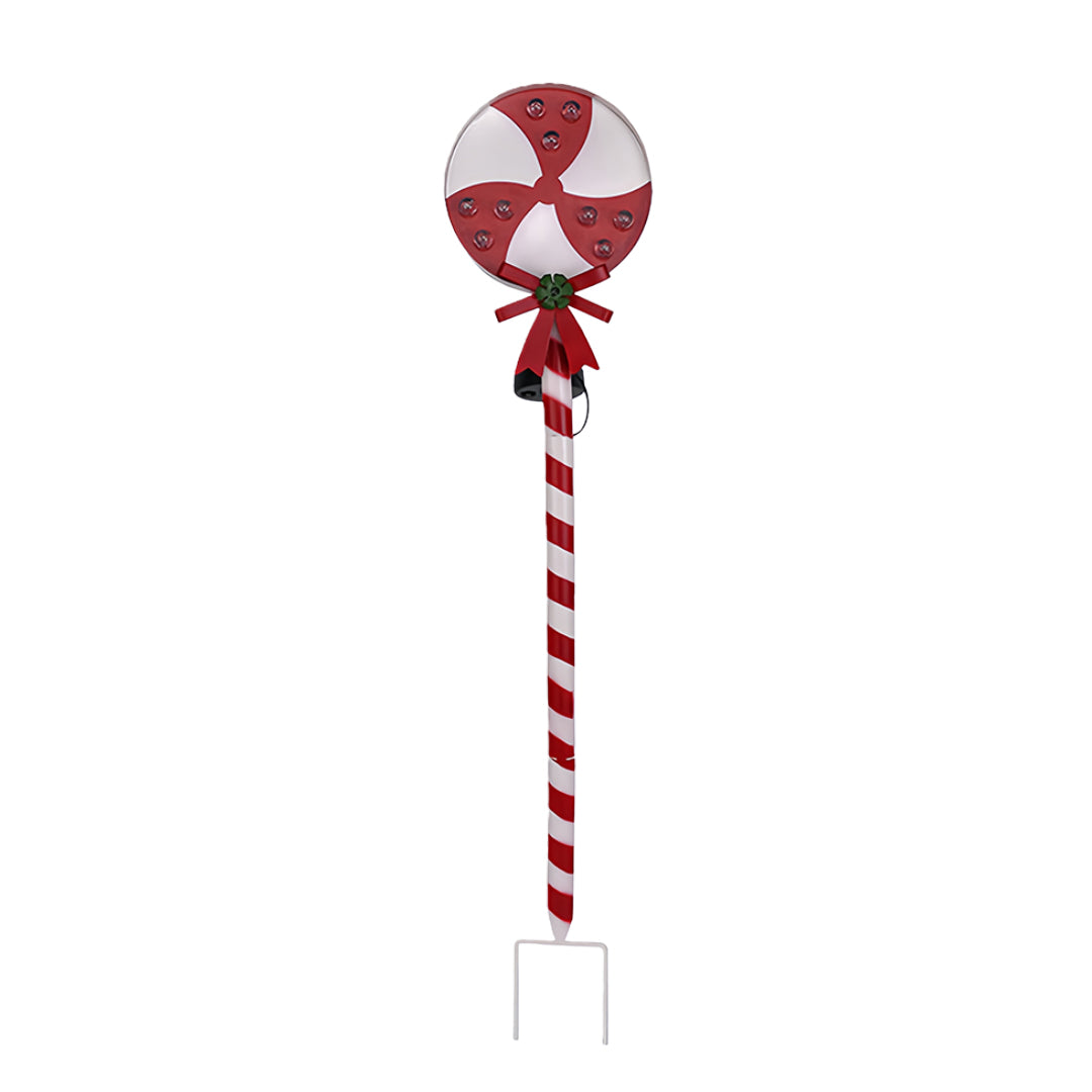 Round peppermint-style ground stake for Christmas lights with red-and-white swirl pattern.