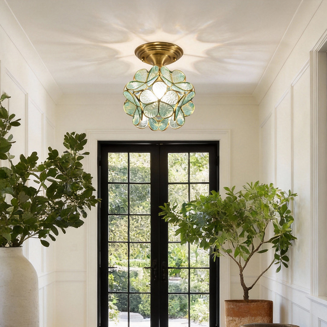 Petal shaped ceiling lights providing soft light in a contemporary entryway.