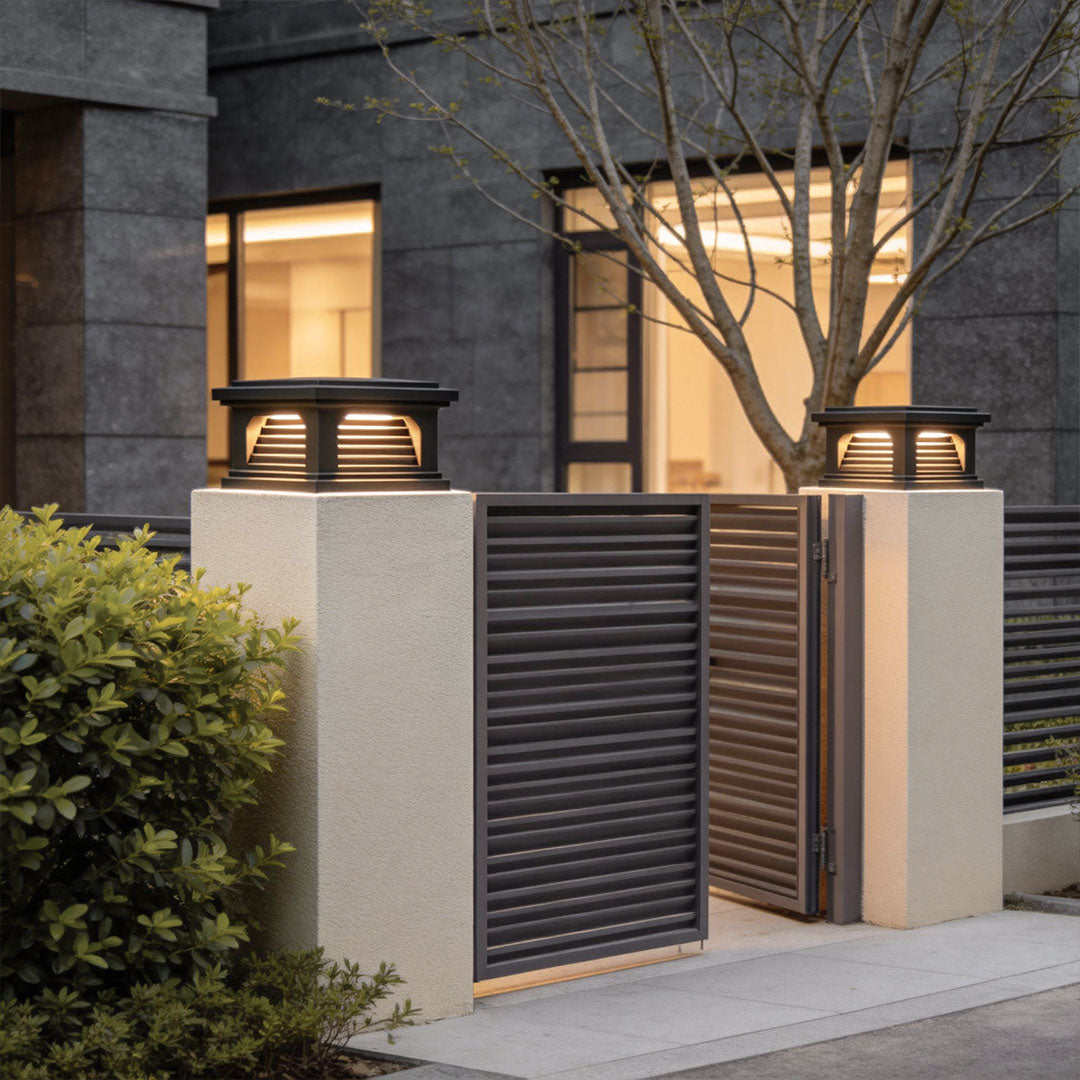 Contemporary pillar light design outdoor with horizontal slats, installed near a modern residence.