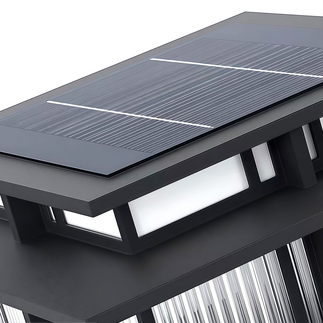 Detailed close-up of vertical glass rods and metal frame of a modern pillar light.