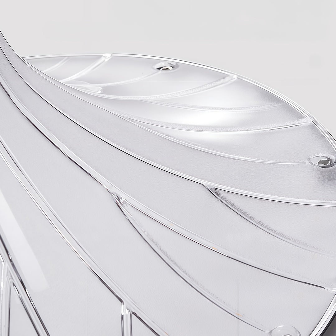 Pillar light along a residential driveway, providing illumination at dusk.