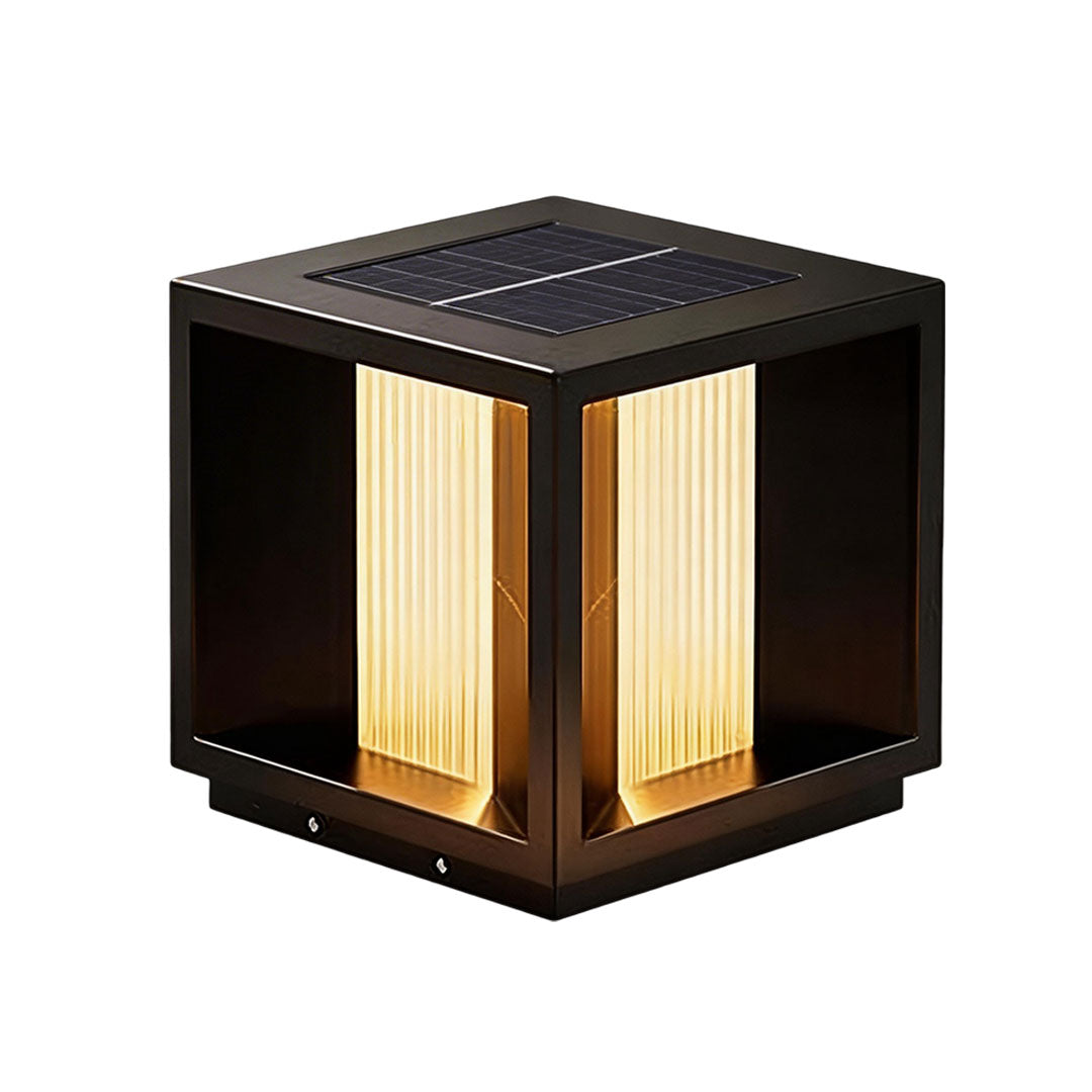 Pillar lighting with a black metal frame and illuminated sides for outdoor use.