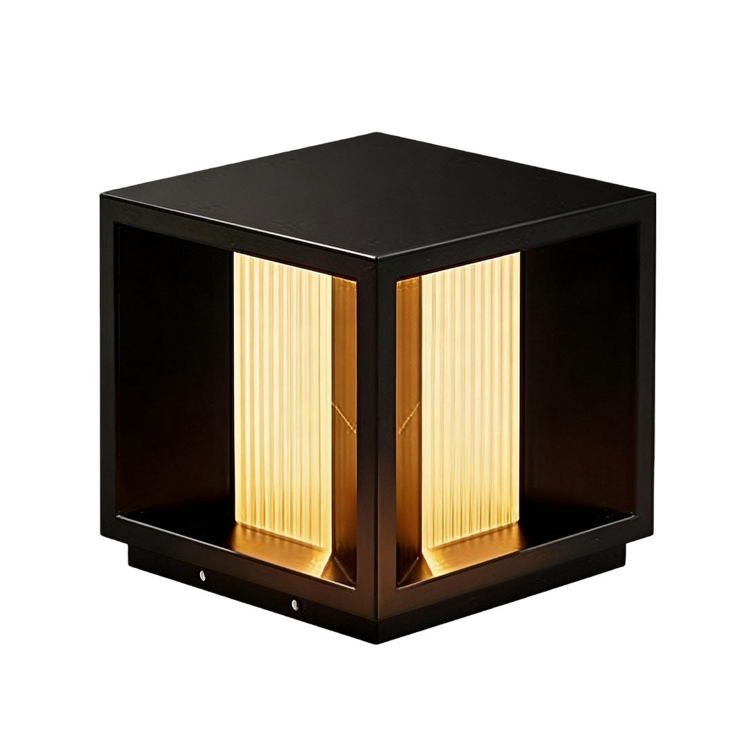 Pillar lighting with a black finish and illuminated vertical slats for contemporary outdoor spaces.
