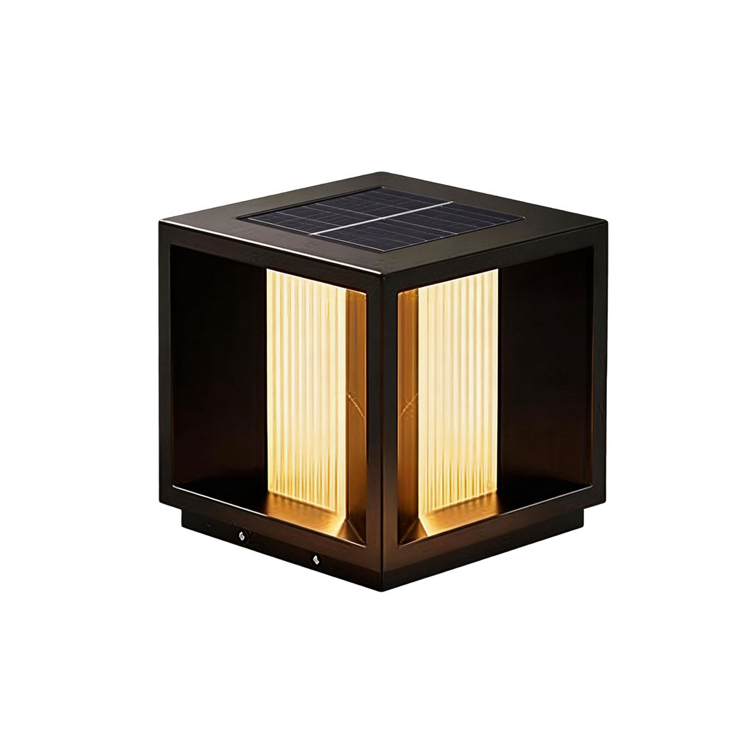 Pillar lighting with a black finish and vertical light slats for outdoor pathways.