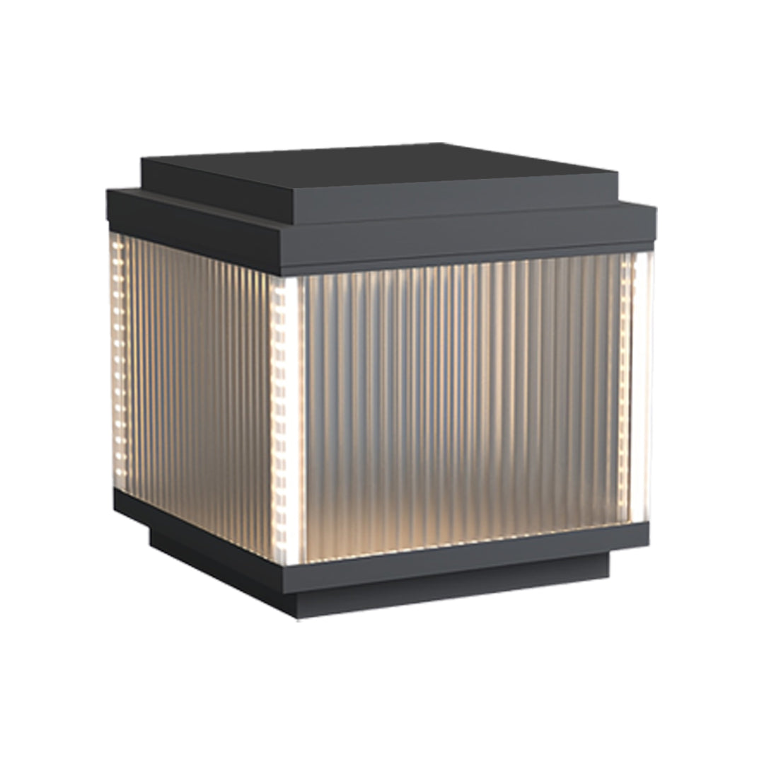 Stylish pillar lighting outdoor fixture offering uniform warm lighting with vertical glass grooves.