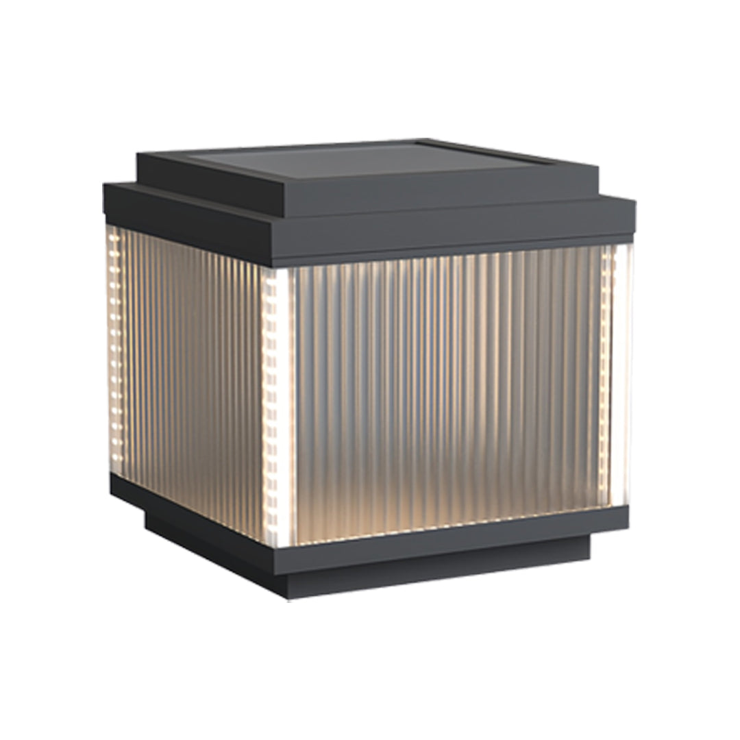 Rectangular pillar lighting outdoor fixture with extended ribbed-glass sides and warm glow.