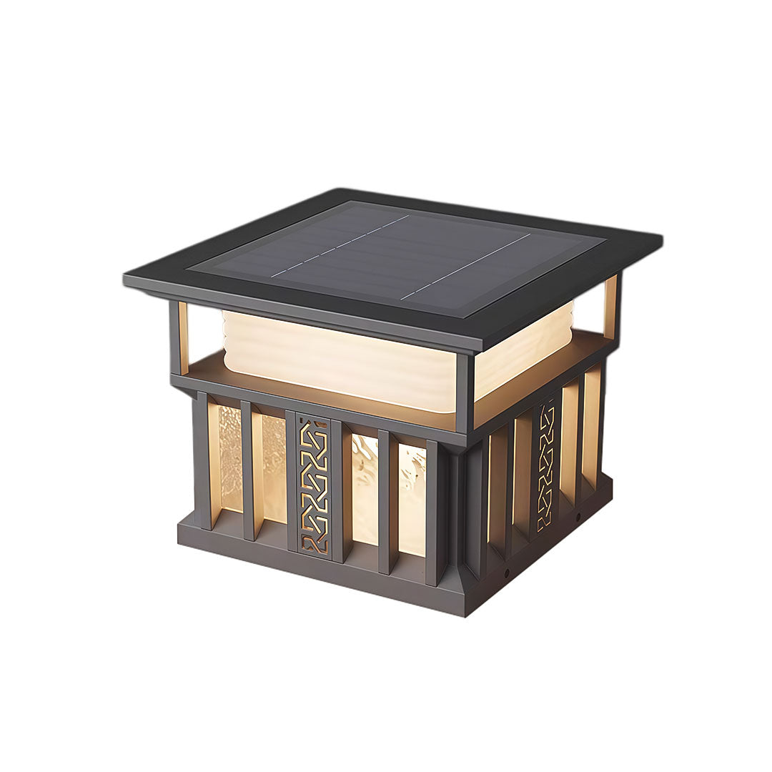 Pillar lights for house with a black metal frame and decorative patterns, providing soft illumination.
