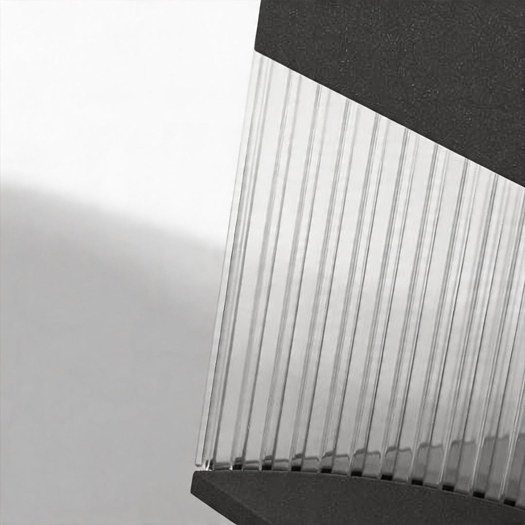 Pillar lights outdoor solar close-up featuring textured black frame and transparent acrylic diffuser.