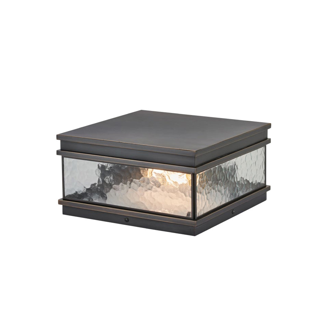 Modern pillar mount light featuring a low-profile square shape and clear panels, suitable for gate posts and outdoor pillars.