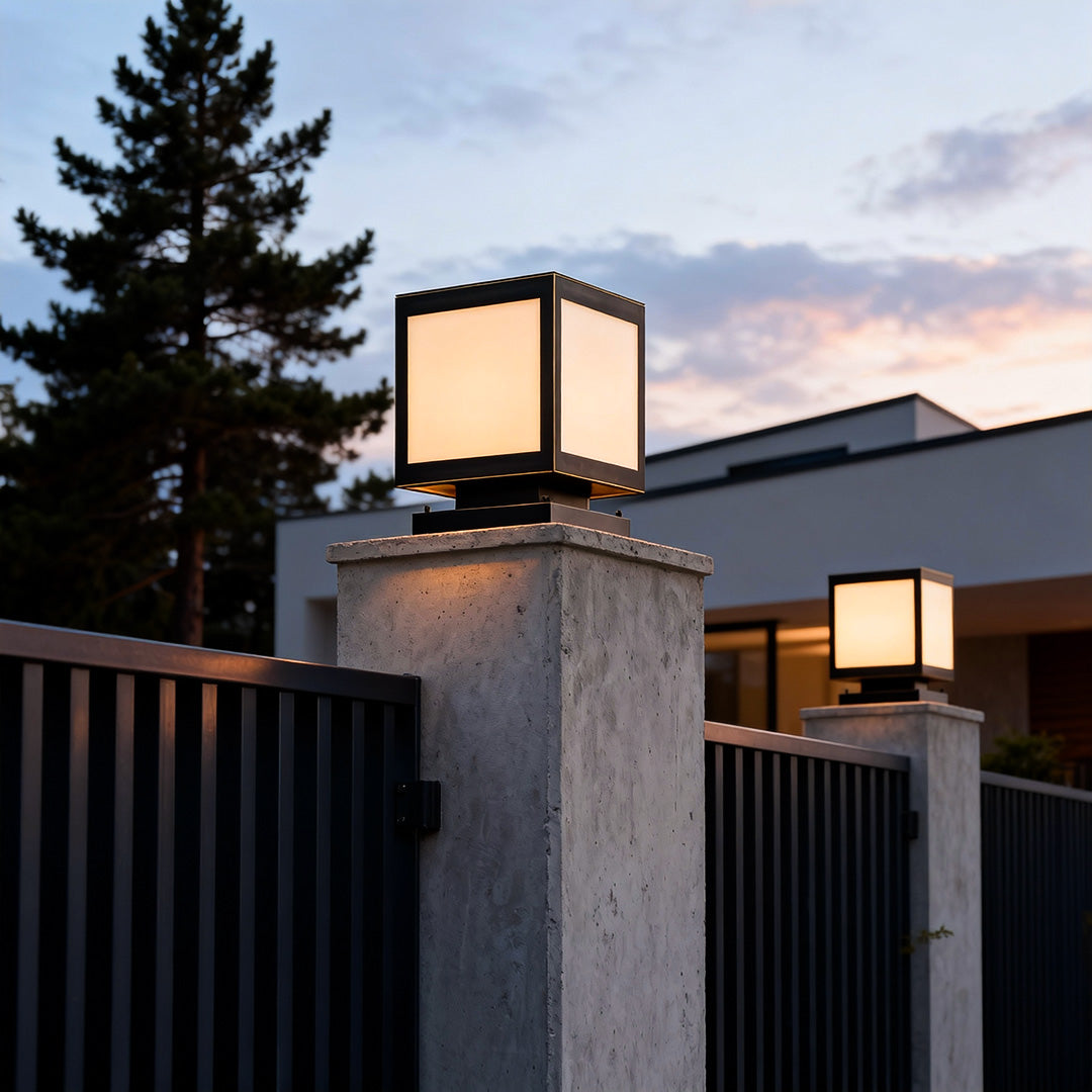 Pillar solar light installed on a concrete fence, providing eco-friendly lighting for outdoor spaces.