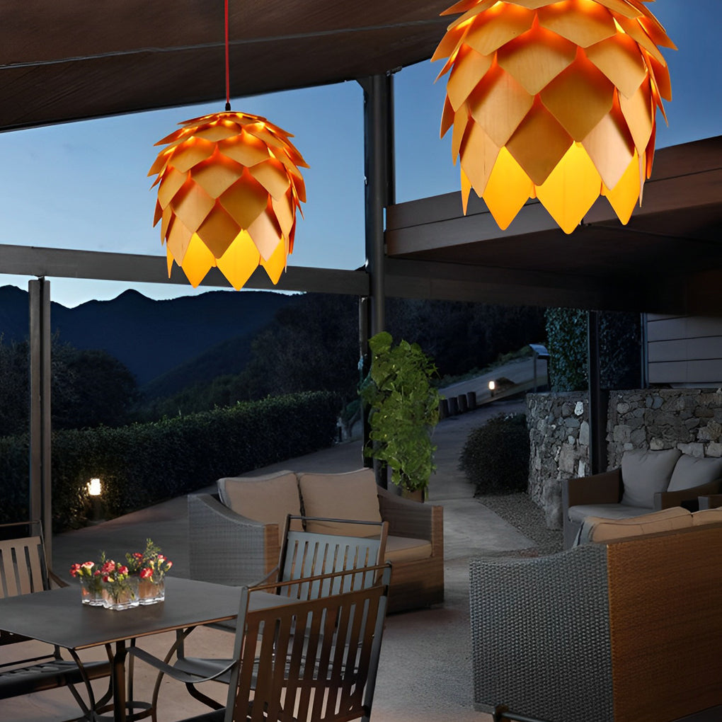 Pinecone pendant light with a close-up of its intricate wooden pinecone pattern.