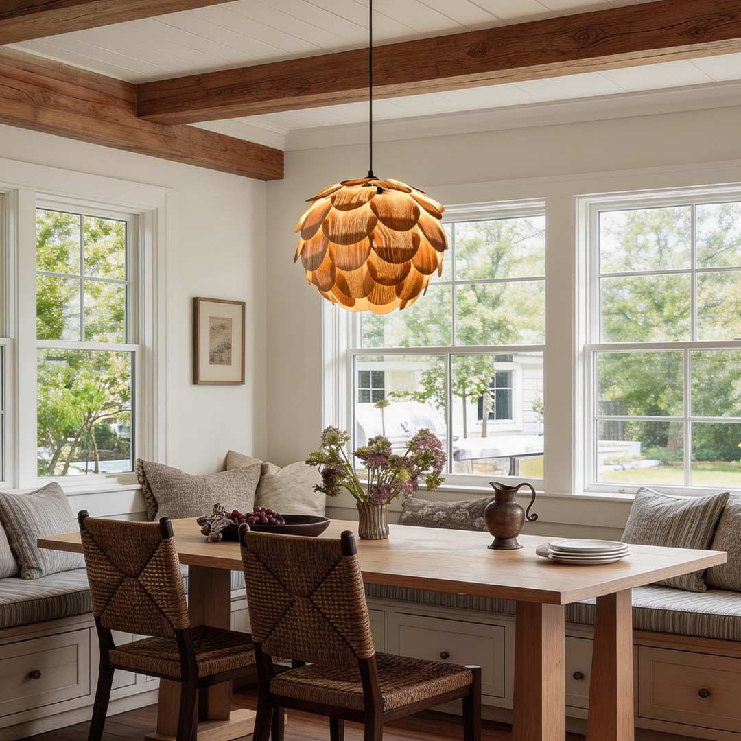 Pinecone pendant light with a natural wood design, hanging above a rustic dining table.