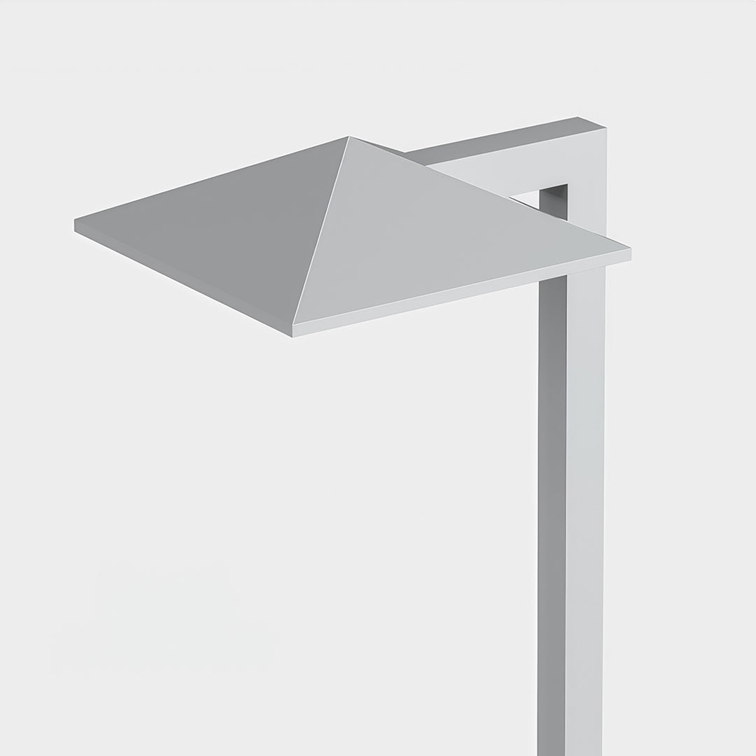 Plug-in pathway light with a tall metallic pole and a flat top, ideal for landscape lighting.