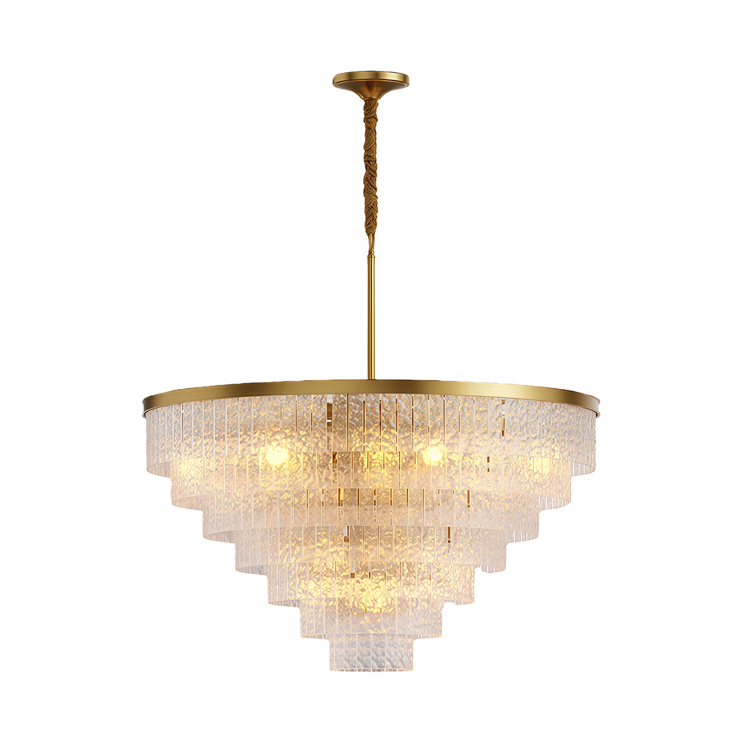 Luxury modern forms chandelier with polished brass and multi-tier textured glass arrangement.