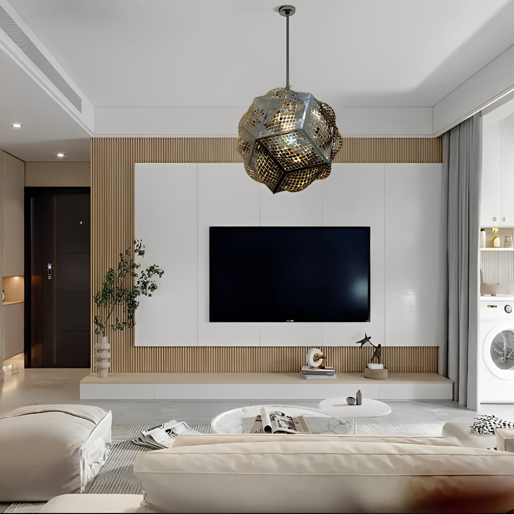 Polyhedron pendant light with a black and gold finish, enhancing a stylish dining room.