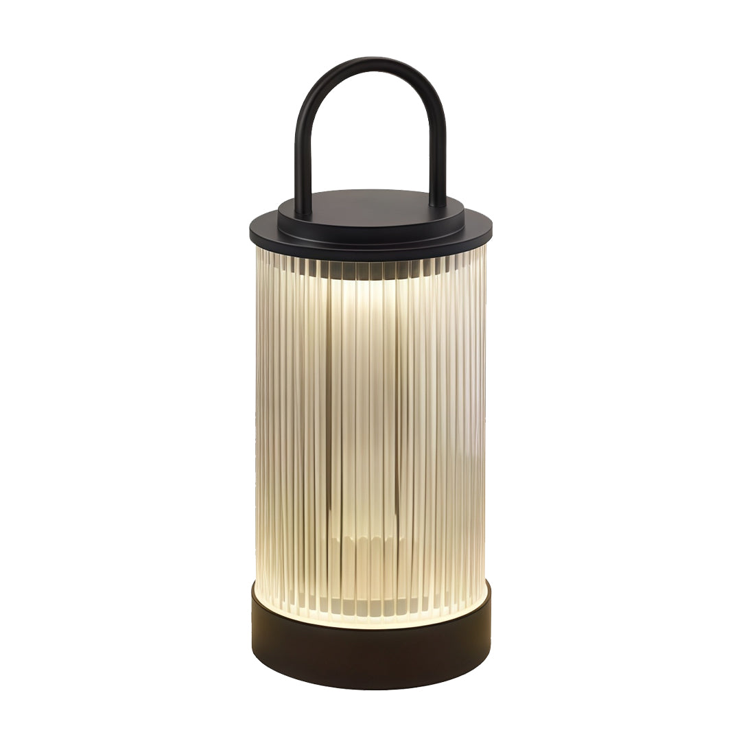 Portable lantern with cylindrical ribbed shade and top-mounted handle providing warm illumination.