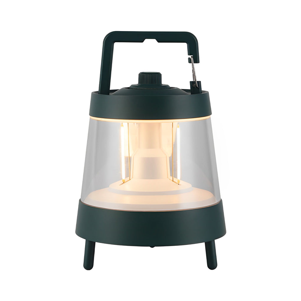 Portable rechargeable LED lamp with a sleek design, providing soft light in a picnic setting.
