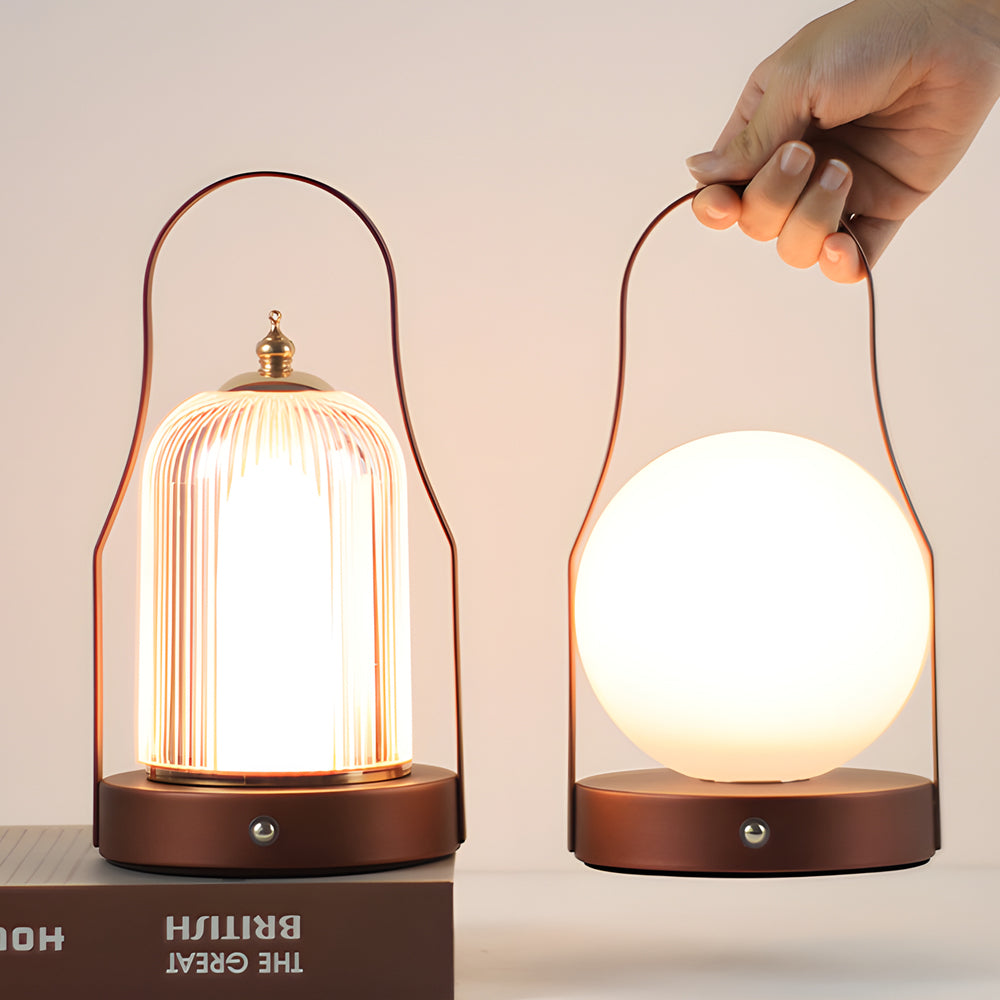 Portable rechargeable LED lantern enhancing a modern desk with elegant, portable design.