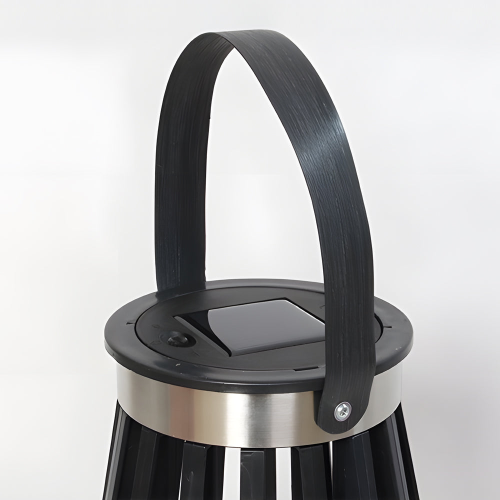 Portable solar lantern with black handle and sleek cylindrical design for outdoor use