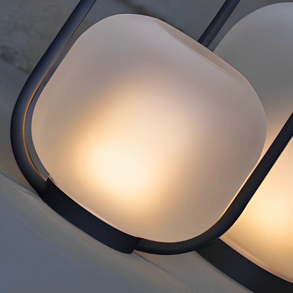 Close-up of a portable solar lantern, highlighting its sleek design and solar panel top.