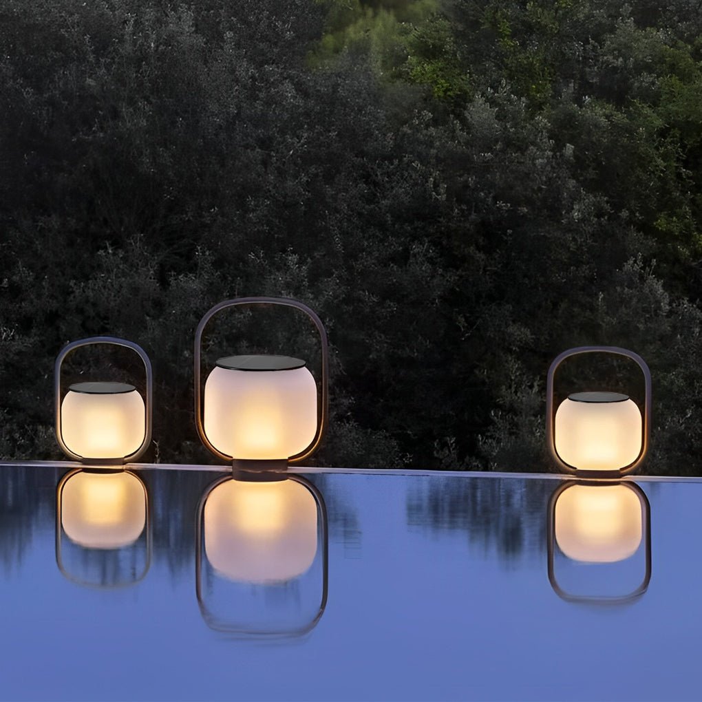 Portable solar lantern on a stone wall, enhancing the outdoor space with subtle lighting.