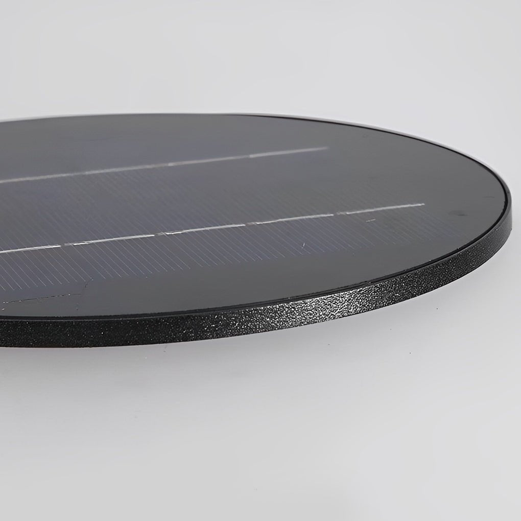 Top view of a portable solar lantern, showcasing the solar panel for charging.