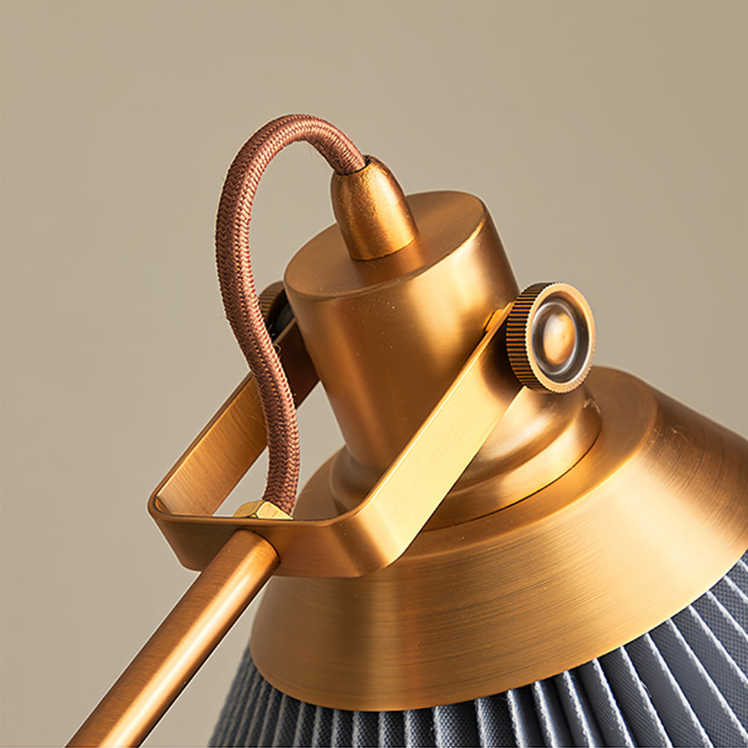 Close-up detail of small black pendant light showing precision brass joints and premium craftsmanship