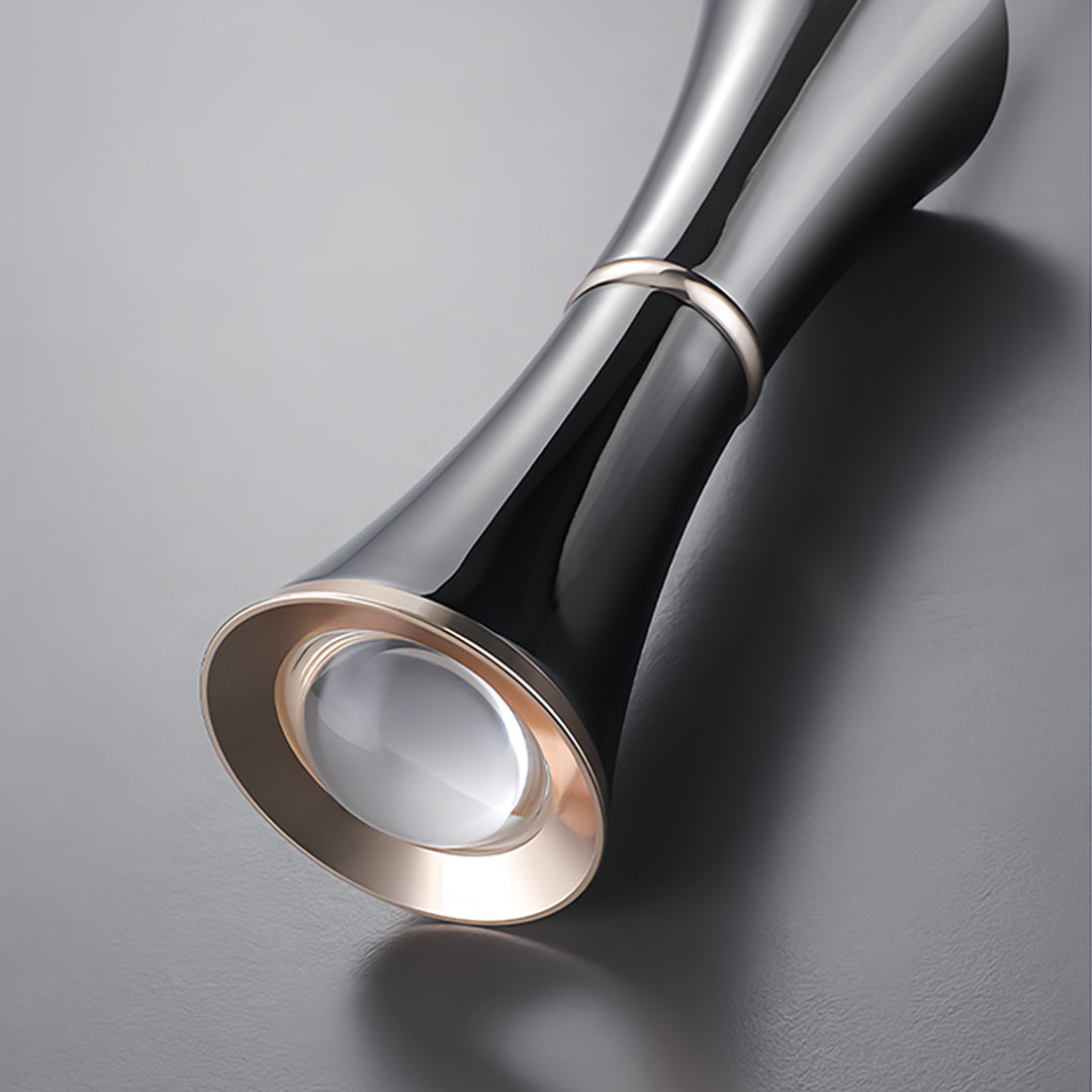 Close-up detail of small black pendant light showing premium finish and craftsmanship