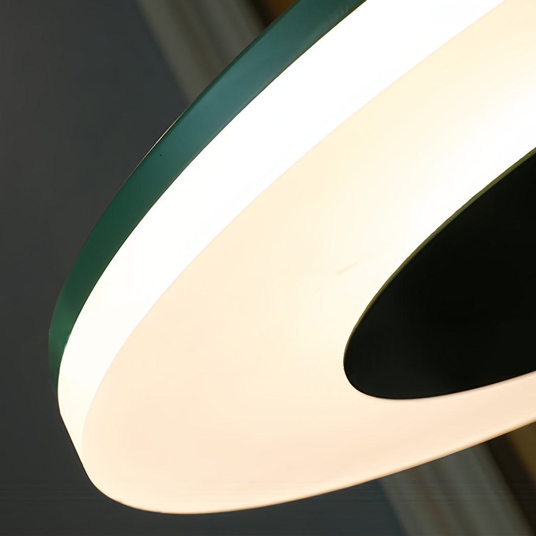 Premium colored floor lamp in black and yellow creating striking contrast in minimalist office space