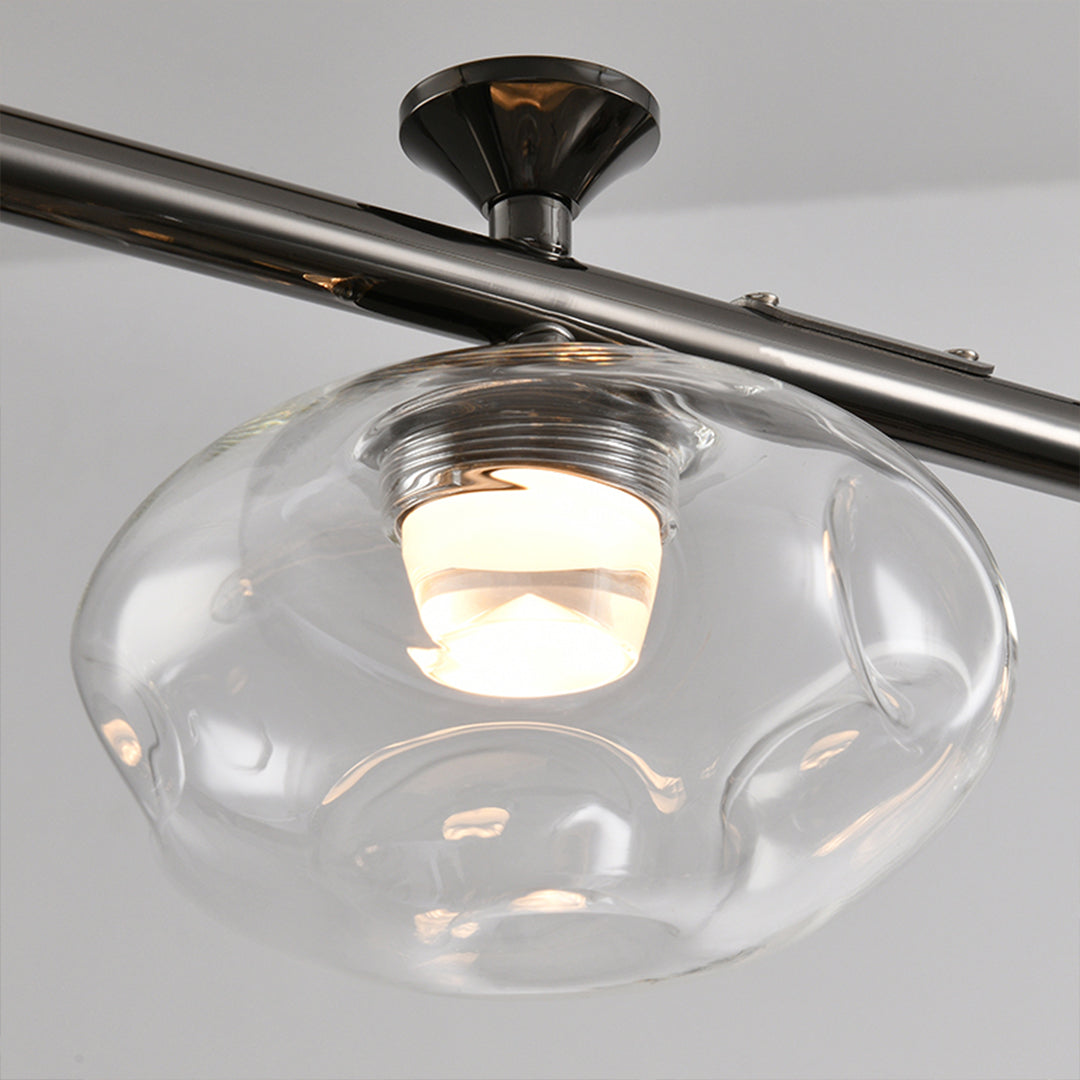 Premium linear glass chandelier with detailed view of clear glass globes on black track