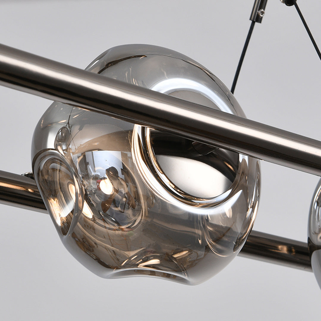 Premium rise and fall pendant light with detailed view of interconnected spherical glass shades