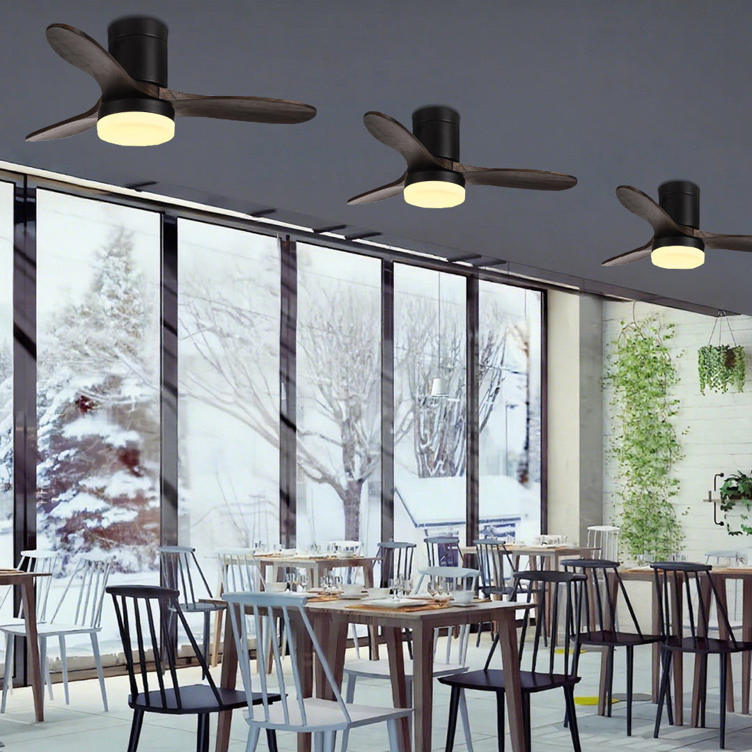 Premium three blade wooden ceiling fan with light installed in upscale restaurant dining area