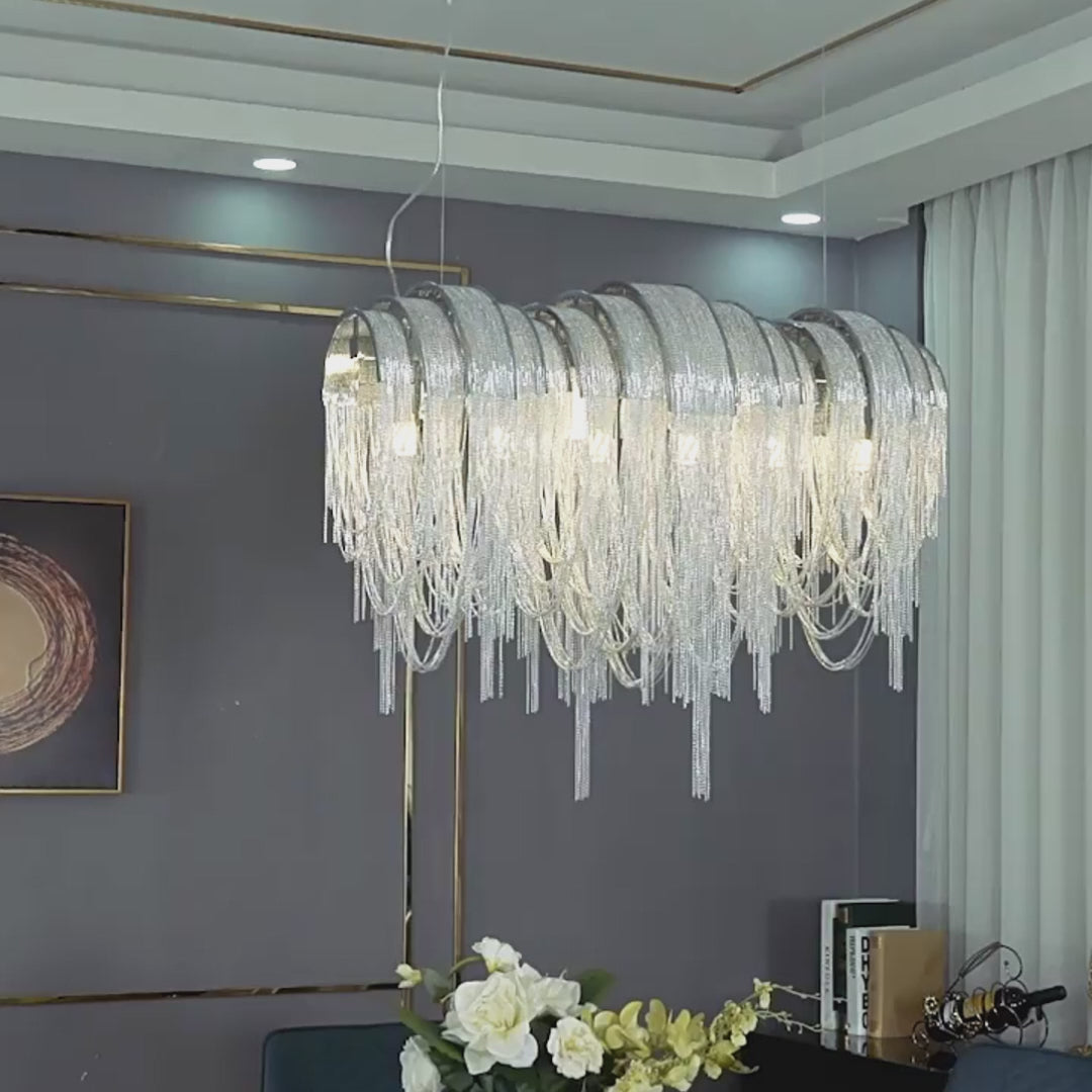 Load video: Waves Aluminum Tassel Chain 3 Step Dimming Artistic Nordic Chandelier