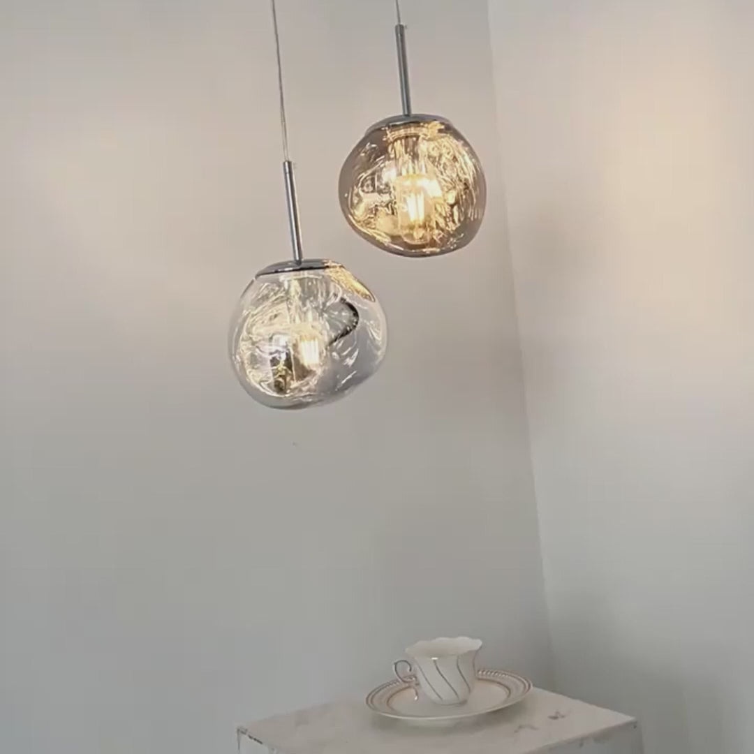 Load video: Simple Lava Acrylic Ball Art Light Luxury Modern Hanging Ceiling Lights