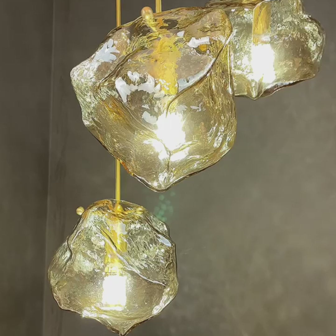 Load video: Irregular Lava Texture Glass Shade Copper Simple Post-Modern Chandelier