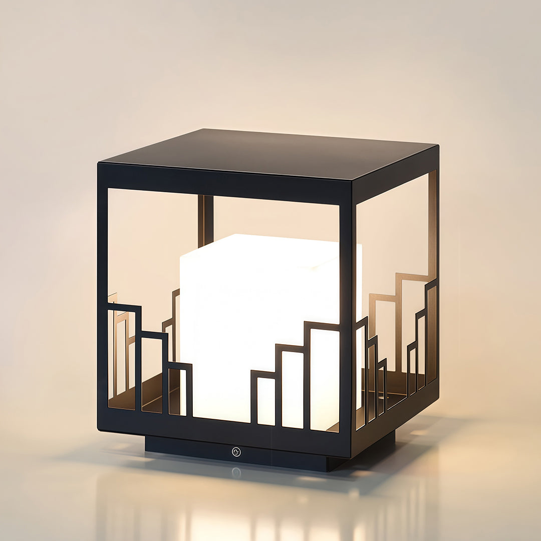 Product view of outdoor pillar light featuring glass shade chandelier aesthetic in square lantern form on neutral background.